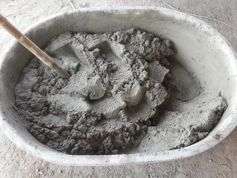Mixing Cement for Plastering Stock Photos