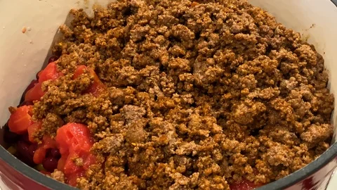 Mixing Chili during Cooking Stock Footage 122646829