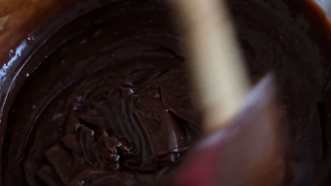 Mixing chocolate dough or batter for baking cakes, cookies, pastry. Mixer Stock Footage 121109852