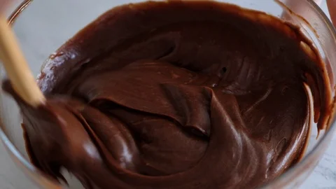 Mixing chocolate dough or batter for baking cakes, cookies, pastry. Mixer Stock Footage 121110193