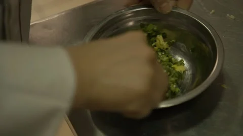 Mixing Chopped Vegetables and Egg for Street Food Preparation in Beijing Kitchen Stock Footage 345881471