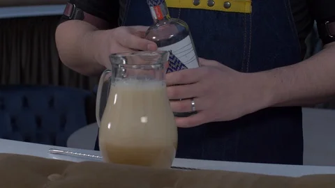 Mixing a cocktail in a jug Stock Footage 130050243