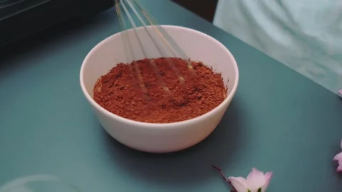 Mixing cocoa with milk on the kitchen table Stock-Footage 252306873