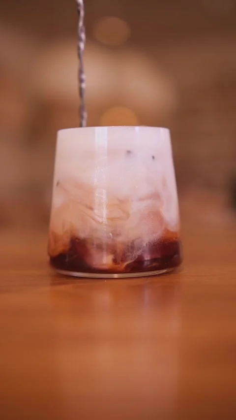 Mixing a coffee drink with ice Stock Footage 312012118