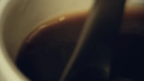 Mixing coffee in slow motion Stock Footage 76249402