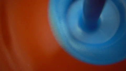 Mixing Colored Liquid Paints Stock Footage 94360031