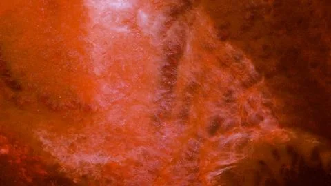 Mixing colorful alcohol inks using close-up techniques in an art setting Stock Photos