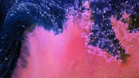 Mixing colors in alcohol ink to create unique patterns and designs Stock Photos