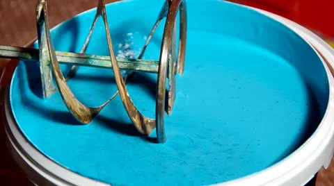 Mixing colors with a drill Stock Footage 32891196