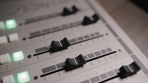 Mixing console also called audio mixer, sound board, mixing deck or mixer is an Stock Footage 72529556
