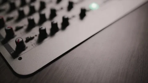 Mixing console also called audio mixer, sound board, mixing deck or mixer is an Stock Footage 72529602