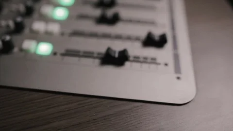 Mixing console also called audio mixer, sound board, mixing deck or mixer is an Stock Footage 72529634