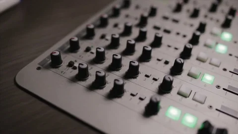 Mixing console also called audio mixer, sound board, mixing deck or mixer is an Stock Footage 72529662