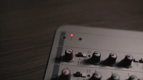 Mixing console also called audio mixer, sound board, mixing deck or mixer is an Stock Footage 72529664