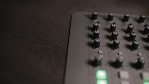 Mixing console also called audio mixer, sound board, mixing deck or mixer is an Stock Footage 72529689