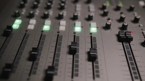 Mixing console also called audio mixer, sound board, mixing deck or mixer is an Stock Footage 72529693