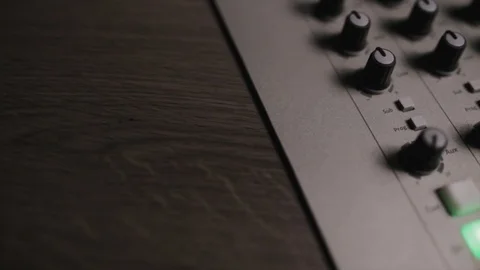 Mixing console also called audio mixer, sound board, mixing deck or mixer is an Stock Footage 72529722