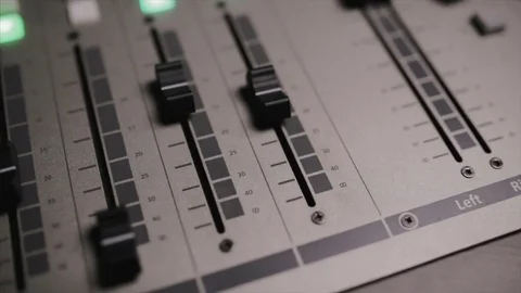 Mixing console also called audio mixer, sound board, mixing deck or mixer is an Stock Footage 72529743