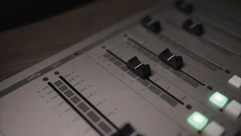 Mixing console also called audio mixer, sound board, mixing deck or mixer is an Stock Footage 72529812