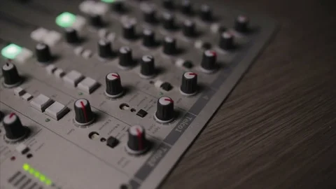 Mixing console also called audio mixer, sound board, mixing deck or mixer is an Stock Footage 72529850