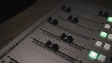 Mixing console also called audio mixer, sound board, mixing deck or mixer is an Stock Footage 72529854