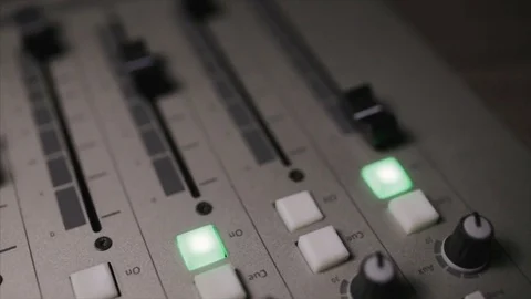 Mixing console also called audio mixer, sound board, mixing deck or mixer is an Stock Footage 72529886