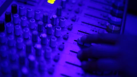 Mixing console also called audio mixer, sound board, mixing deck or mixer is an Stock Footage 93161071