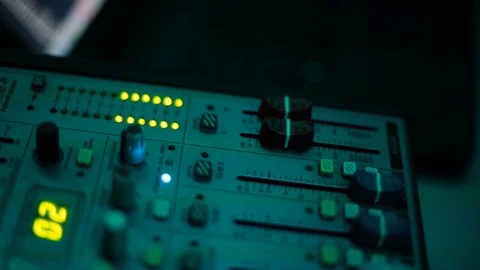 Mixing console also called audio mixer, sound board, mixing deck or mixer is an Stock Footage 93161098