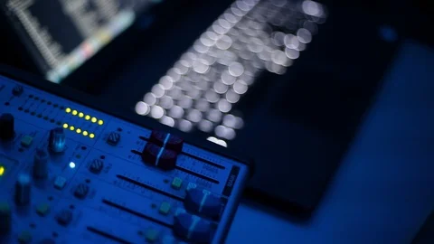 Mixing console also called audio mixer, sound board, mixing deck or mixer is an Stock Footage 93161159