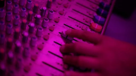 Mixing console also called audio mixer, sound board, mixing deck or mixer is an Stock Footage 93161212