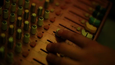 Mixing console also called audio mixer, sound board, mixing deck or mixer is an Stock Footage 93161233