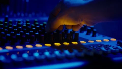 Mixing Console Faders in Use at a Professional Recording Studio Stock Footage 205545731
