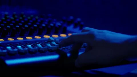 Mixing Console Faders in Use at a Professional Recording Studio Stock Footage 205545980