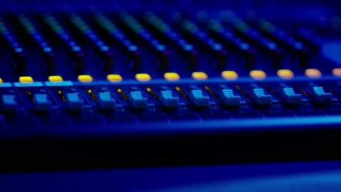 Mixing Console Faders in Use at a Professional Recording Studio Stock Footage 205545982