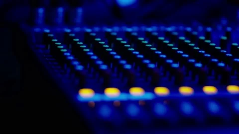 Mixing Console Faders in Use at a Professional Recording Studio Stock Footage 205545983