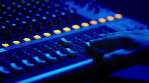 Mixing Console Faders in Use at a Professional Recording Studio Stock Footage 205546013