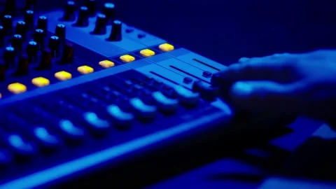Mixing Console Faders in Use at a Professional Recording Studio Stock Footage 205546060