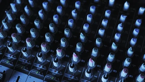 Mixing Console Knobs with Changing Studio Lights 스톡 동영상 318789179