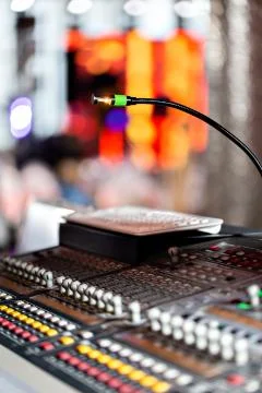 Mixing console of light equipment operator at the concert. Sound recording Stock Photos