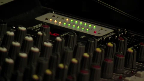 A Mixing Console or Mixing Desk in Recording Studio. Close Up. Stock Footage 245671035