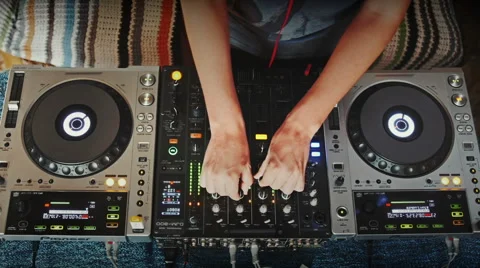 Mixing console time lapse. Hands DJ mixing music at an underground party Video stock 58353030