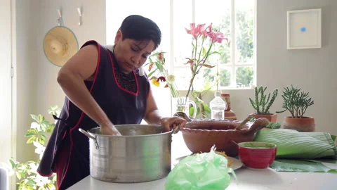 Mixing corn dough masa with hands 33 Stock Footage 135888132