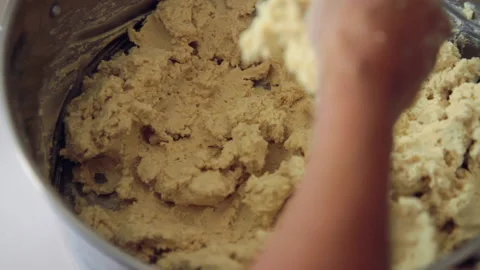 Mixing corn dough masa with hands 34 Stock Footage 135889011