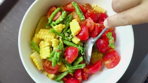 Mixing corn salad Stock-Footage 342672657