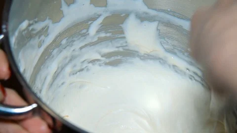 Mixing the cream in the dish Stock Footage 91549059