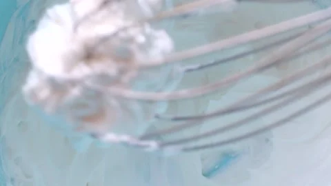 Mixing the cream with a whisk Stock Footage 190012982