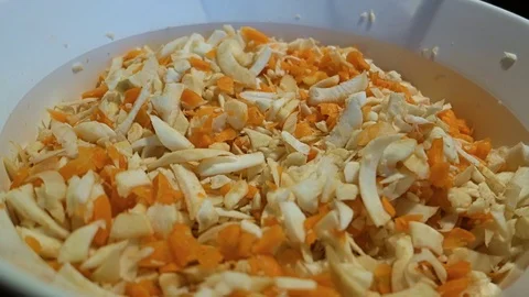 Mixing of cut vegetables by hand Stock Footage 124394997