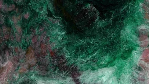Mixing different colored alcohol inks in a creative close-up view Stock Footage 342126457