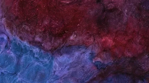 Mixing different colored alcohol inks in a close-up view Stock Footage 342138688