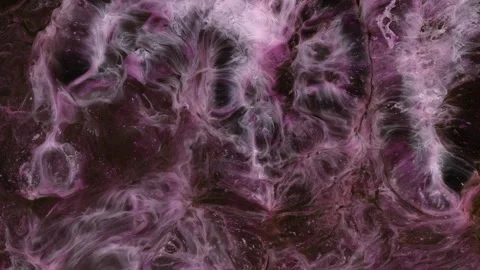 Mixing different colored alcohol inks in a close-up view Stock Footage 342156914